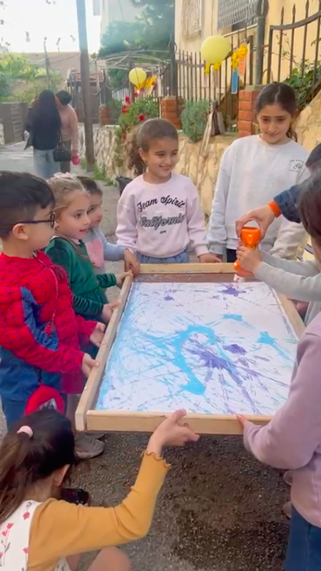 Children collaborating on a workshop activity